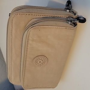 KIPLING beige zip around wallet